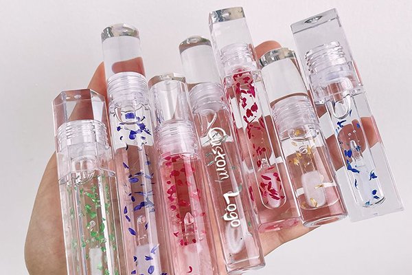 ![Lip gloss tubes, capacity and functionality](https://jinlinpackaging.com/wp-content/uploads/2024/11/Determining-the-Right-Capacity-and-Functionality-for-Your-Lip-Gloss-Tubes.jpg "Lip gloss tube selection")